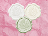 White, Sage Green and Ivory Wax Seals Featured on Rose Pink Tissue Paper