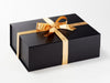 Example of Gold Merry Christmas Recycled Satin Ribbon Featured on Black A4 Deep Gift Box